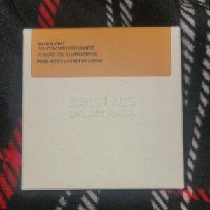 Haus Labs by Lady Gaga Bio-Radiant Gel-Powder Highlighter in shade Raw Amber